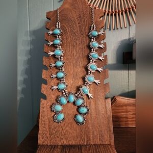 Squash blossom necklace. Costume jewlry. Measurements are 15in long/3in extender